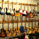 Danche-Guitars-on-Wall-11