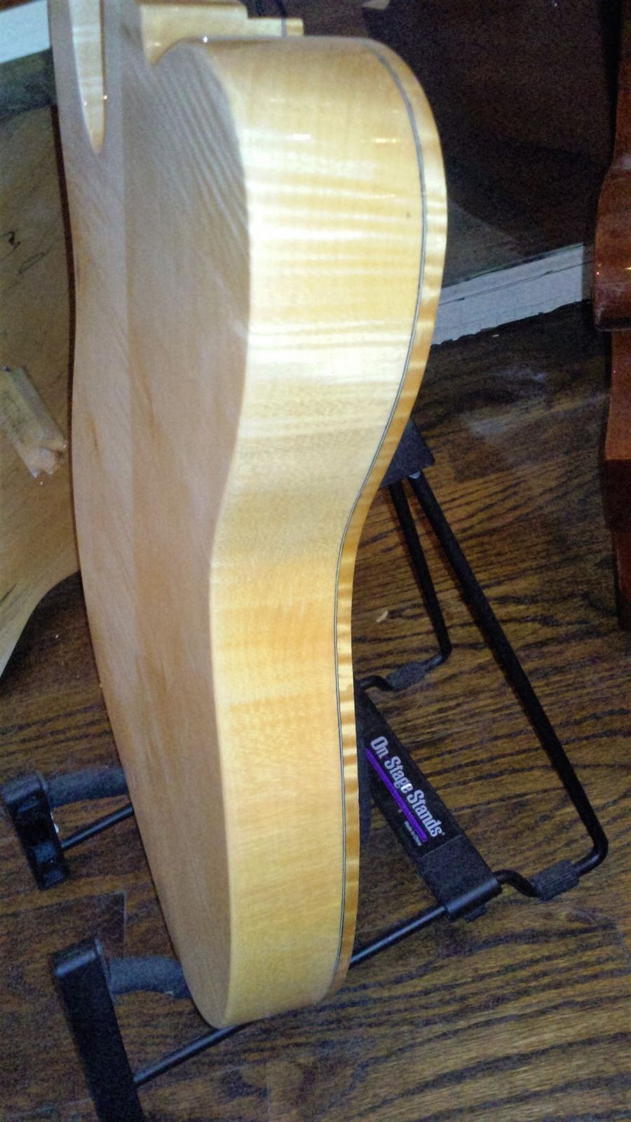 Handmade guitar body, side view