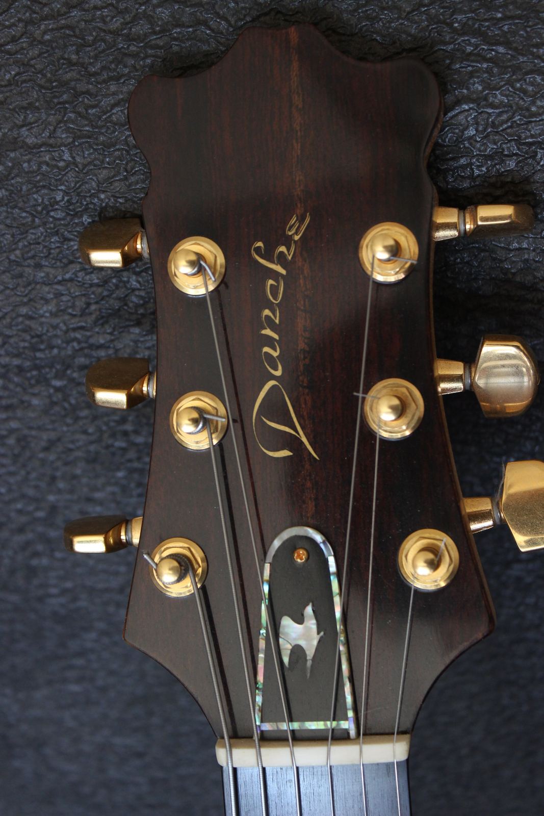 DZ 57 headstock with Danche inlay and gold tuners