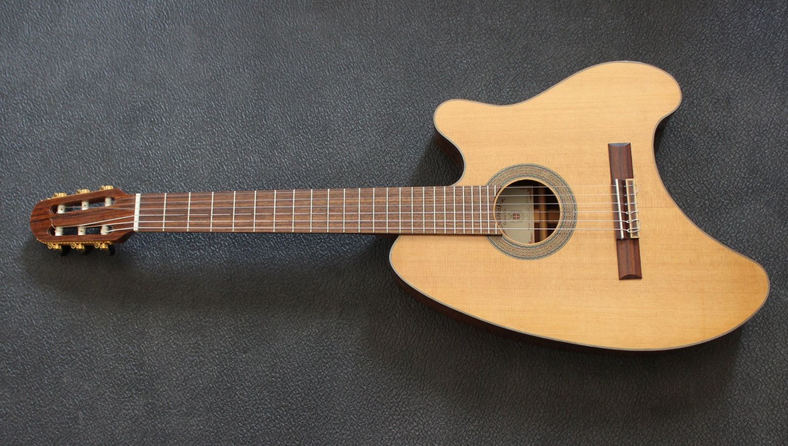GoGo nylon-string guitar with cutaway
